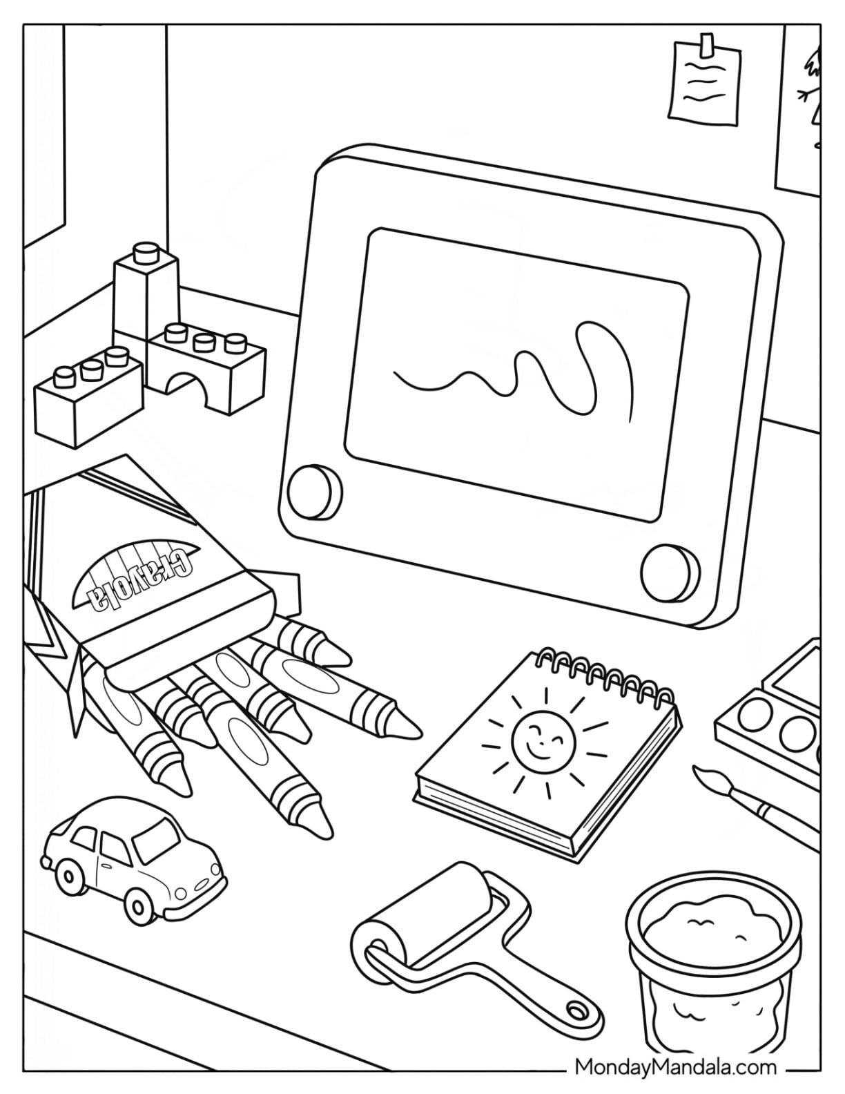 Drawing Tablet, Crayons, Notebook, and Lego on a Table